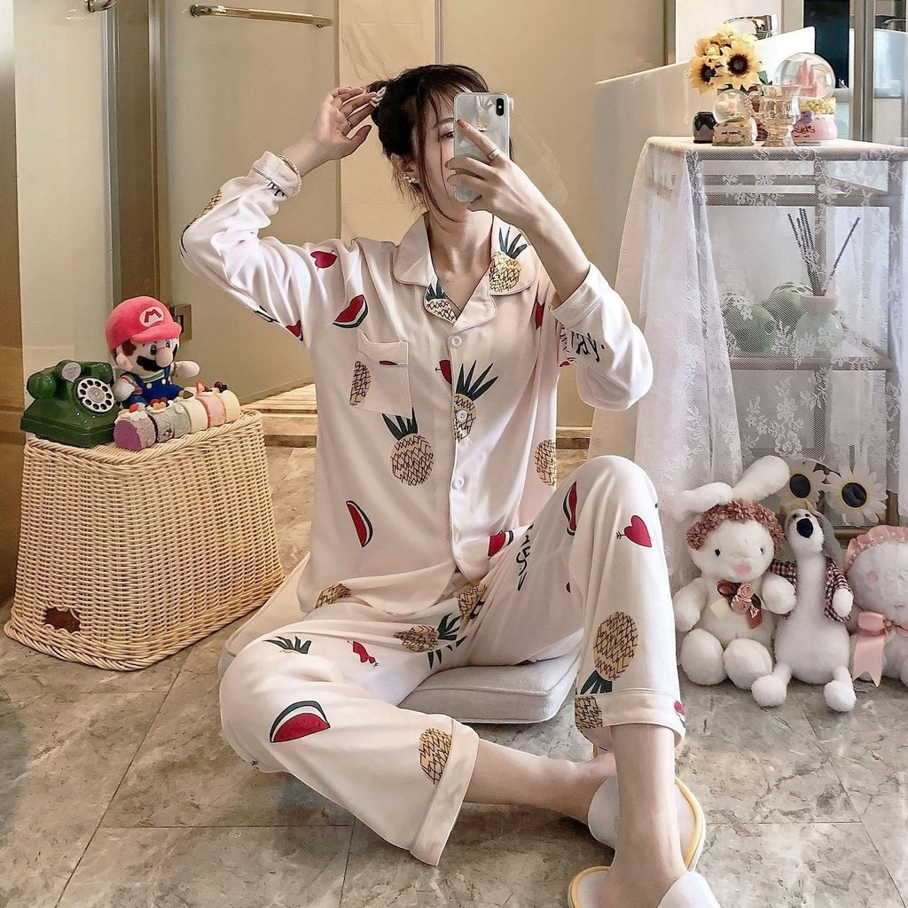 My Store women's light pink pajama set with pineapple, watermelon, and heart prints. Button-down top and elastic waist pants.