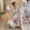 My Store women's light pink pajama set with pineapple, watermelon, and heart prints. Button-down top and elastic waist pants.