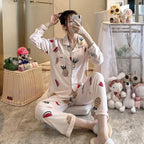 My Store women's light pink pajama set with pineapple, watermelon, and heart prints. Button-down top and elastic waist pants.